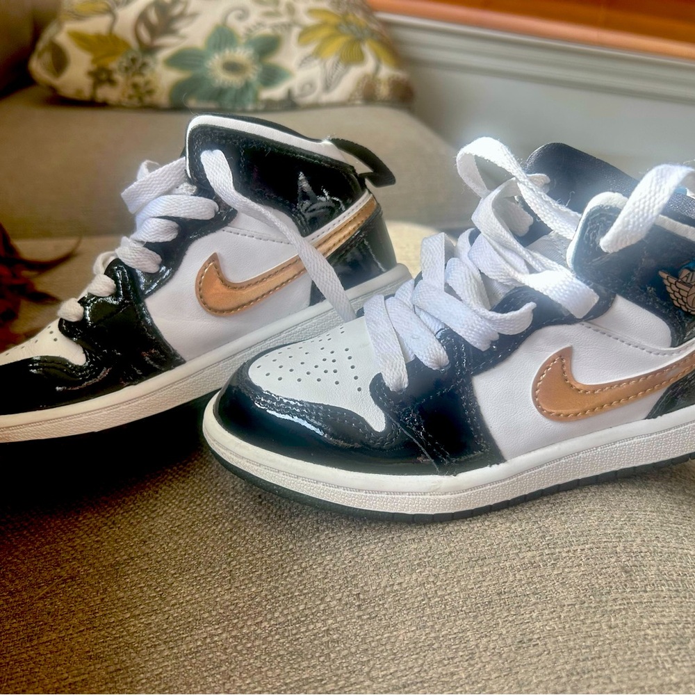 White black and gold AirJordans size 11